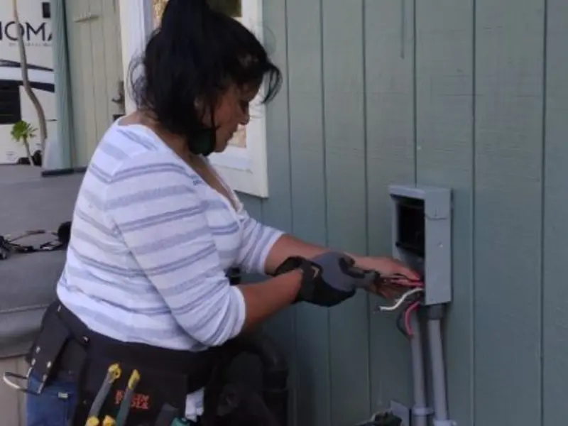 Licensed electrician wiring an exterior subpanel in Walla Walla