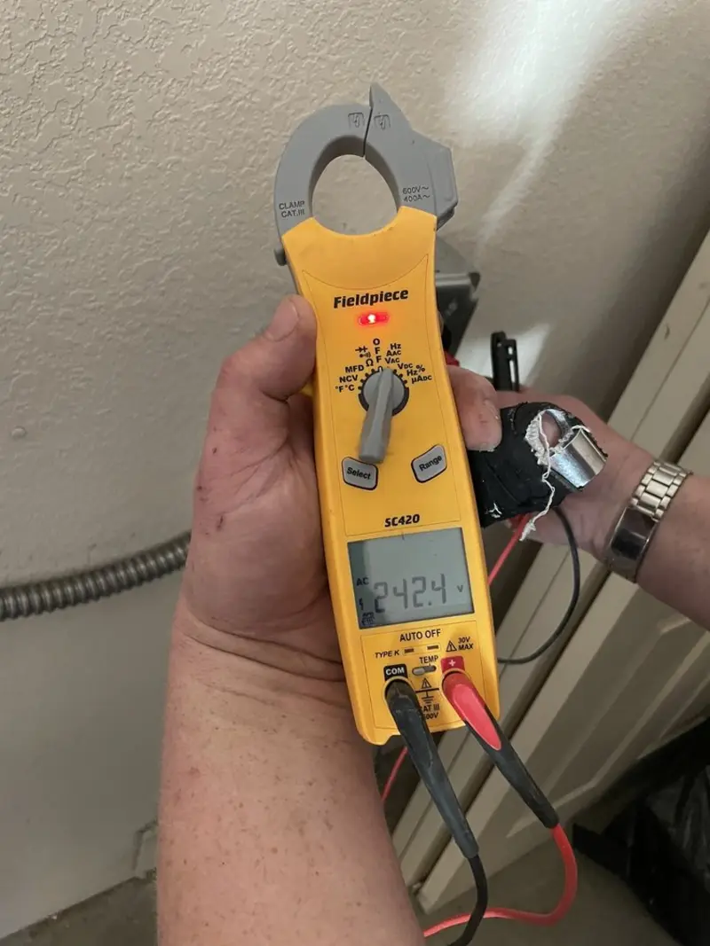 Voltage testing with clamp meter during Recessed Lighting Installation in Walla Walla
